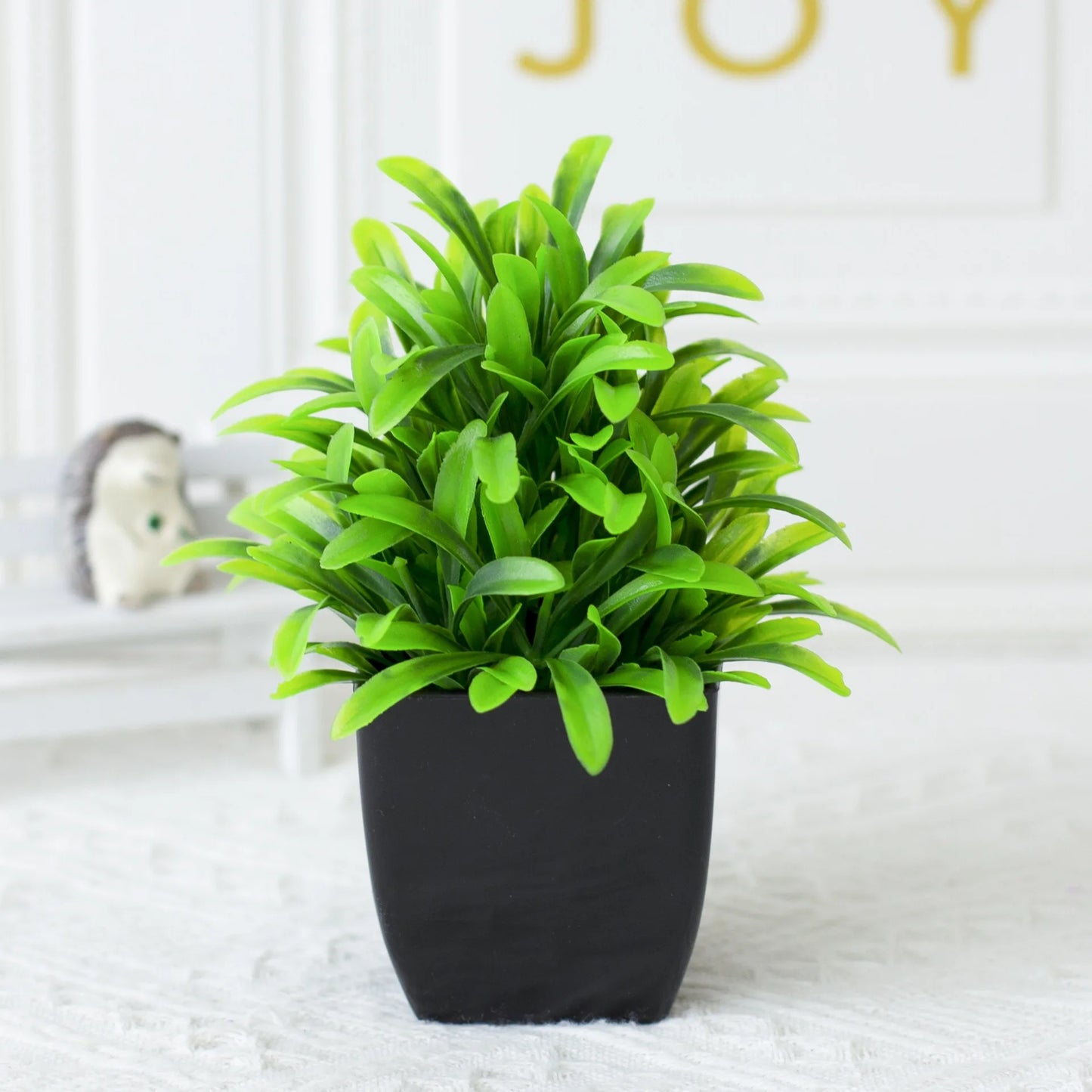 One Fake Plant Black Pot
