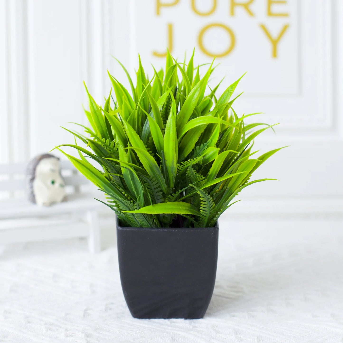 One Fake Plant Black Pot